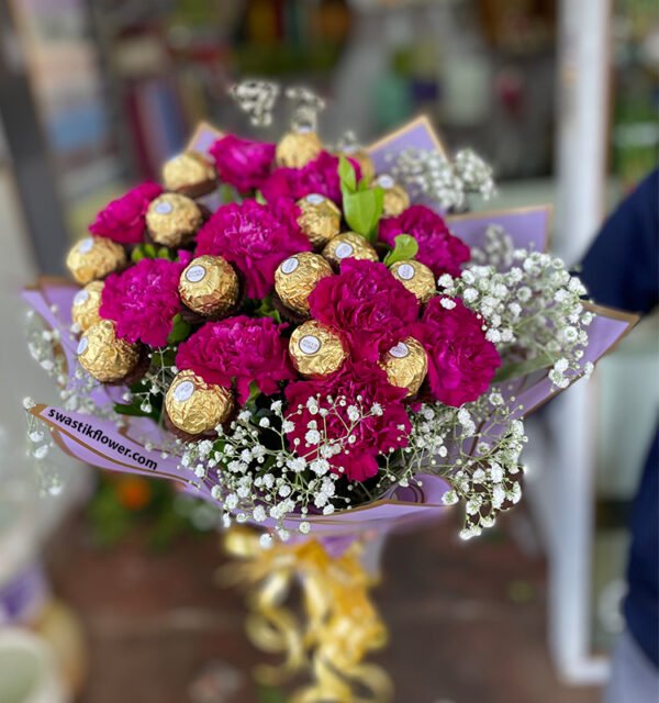 Ferrero With Purple Carnation Hand Bunch